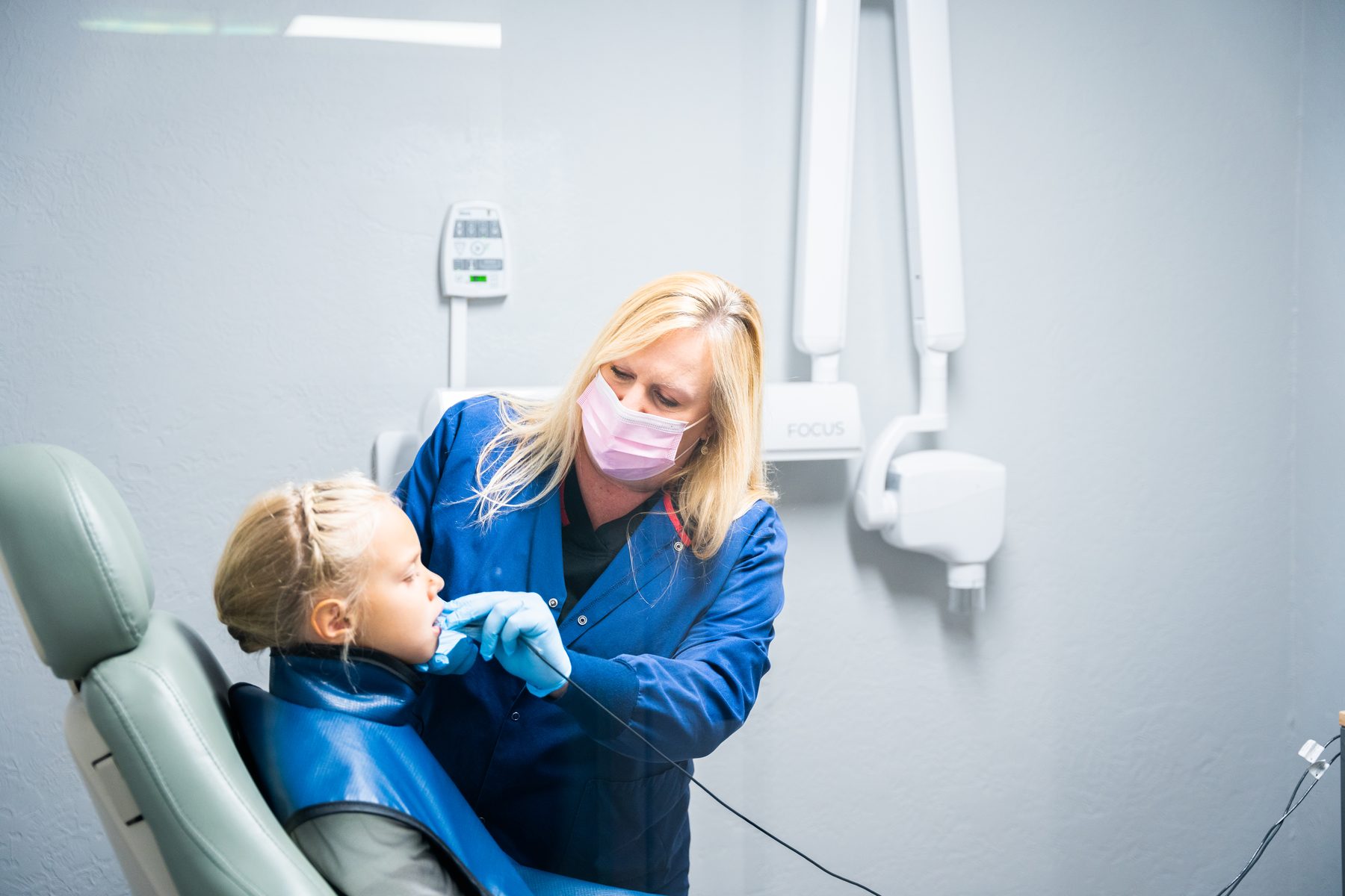 A young patient laughing during a checkup